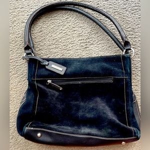 NWOT TIGNANELLO LEATHER BLACK SHOULDER BAG. Vivid color interior! 3 Compartments